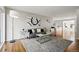 Stylish living room featuring modern decor, hardwood floors, and plenty of natural light at 7413 S Tamarac St, Centennial, CO 80112