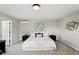 Airy main bedroom offers carpet floors, minimalist decor, and plenty of natural light at 7413 S Tamarac St, Centennial, CO 80112