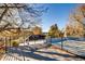 Rooftop deck area with metal railing offering great views of the city at 3122 Perry St, Denver, CO 80212