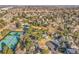 Aerial view showcasing home location near community pool, tennis courts, and green spaces at 3269 W 101St Cir, Westminster, CO 80031