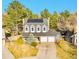 Aerial view of a two-story home featuring a well-manicured lawn and a two-car garage at 3269 W 101St Cir, Westminster, CO 80031