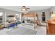 Spacious bedroom featuring a bunk bed with zebra-striped rug and a workstation with natural lighting at 3269 W 101St Cir, Westminster, CO 80031