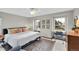 Comfortable bedroom with a ceiling fan, light walls, and natural light from the windows at 3269 W 101St Cir, Westminster, CO 80031