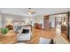 Relaxing main bedroom with hardwood floors, sitting area and wood furnishings at 3269 W 101St Cir, Westminster, CO 80031