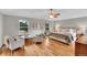 Tranquil main bedroom with hardwood floors, natural light and sitting area at 3269 W 101St Cir, Westminster, CO 80031