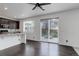 Kitchen area leading to an outdoor deck, offering seamless indoor-outdoor living at 9250 Rifle St, Commerce City, CO 80022