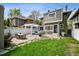 Large backyard features a dining area, seating area, pergola, and grassy area, perfect for outdoor gatherings and relaxation at 758 N Franklin St, Denver, CO 80218