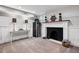 Finished basement area with a fireplace, wine cooler, and stylish nautical decor at 758 N Franklin St, Denver, CO 80218