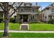 Charming two-story home with landscaped front yard, inviting curb appeal, and classic architectural details at 758 N Franklin St, Denver, CO 80218