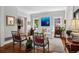 A bright living room featuring a white couch, hardwood floors, and decorative accents at 758 N Franklin St, Denver, CO 80218