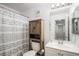Bright bathroom with vanity, mirror and walk-in shower at 10700 Kimblewyck Cir # 225, Northglenn, CO 80233
