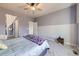 Relaxing bedroom includes a bed, plush carpet, and access to an ensuite bathroom, perfect for unwinding at 6924 E 118Th Pl, Thornton, CO 80233