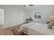 Bright bedroom features a window, neutral decor, closet, and a comfortable bed at 3025 Ivanhoe St, Denver, CO 80207