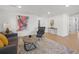 Cozy living room boasts hardwood floors, stylish decor, and an open floor plan at 3025 Ivanhoe St, Denver, CO 80207