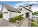 Charming two-story home featuring a well-manicured lawn, mature landscaping and a two car garage at 3841 Colorful Ln, Castle Rock, CO 80109