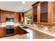 Modern kitchen featuring granite countertops, stainless steel appliances, and attractive cabinetry at 3841 Colorful Ln, Castle Rock, CO 80109