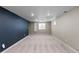 Finished basement featuring neutral walls and carpet, ideal for recreation at 1996 S Dexter St, Denver, CO 80222