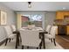 Inviting dining room featuring a dark wood table and seating for six, perfect for Gathering meals at 1996 S Dexter St, Denver, CO 80222