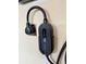 Close-up of an Anker electric vehicle charger installed in a garage at 3029 Merlin Dr, Brighton, CO 80601