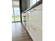 Close up of modern kitchen cabinets with granite countertops at 3029 Merlin Dr, Brighton, CO 80601