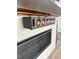 Close up of wall-mounted speaker system above fireplace at 3029 Merlin Dr, Brighton, CO 80601