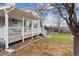 A fenced backyard features a covered patio and grassy area at 10825 Mount Antero Way, Parker, CO 80138