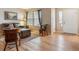 Bright living room featuring hardwood floors, large windows, and neutral decor at 10825 Mount Antero Way, Parker, CO 80138