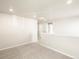 Upstairs hallway with neutral decor and carpet flooring at 570 Red Rock Pl, Brighton, CO 80601