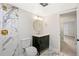 Modern bathroom with marble shower and updated vanity at 2000 E 12Th Ave # 15D, Denver, CO 80206