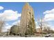 High-rise building with city views and landscaping at 2000 E 12Th Ave # 15D, Denver, CO 80206