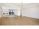 Bright living room with hardwood floors and city views at 2000 E 12Th Ave # 15D, Denver, CO 80206