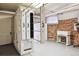 Unique basement featuring storage units and a vintage laundry press at 836 E 17Th Ave # 1A, Denver, CO 80218