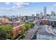 Scenic Denver cityscape showcasing diverse architecture and vibrant urban living against a bright, cloudy sky at 836 E 17Th Ave # 1A, Denver, CO 80218