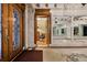Elegant foyer with marble columns, ornate doorway, and classic design elements at 836 E 17Th Ave # 1A, Denver, CO 80218