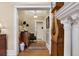 Charming hallway with hardwood floors and vintage decor at 836 E 17Th Ave # 1A, Denver, CO 80218