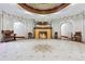 Ornate lobby features decorative tiled floors, arched doorways, and a vintage fireplace, embodying classic elegance at 836 E 17Th Ave # 1A, Denver, CO 80218