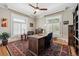 A large home office featuring a ceiling fan, hardwood floors and an oriental rug at 836 E 17Th Ave # 1A, Denver, CO 80218