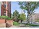 Brick apartment building street view featuring landscaping and access to downtown Denver at 836 E 17Th Ave # 1A, Denver, CO 80218