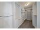 Spacious walk-in closet with custom shelving, drawers, and ample storage at 6786 Halifax Ave, Castle Rock, CO 80104