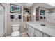 Stylish bathroom featuring modern fixtures, shelving, and decorative accents at 6211 S Garfield Dr, Centennial, CO 80121