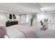 Bedroom with a study space, plush carpet, and natural lighting at 6211 S Garfield Dr, Centennial, CO 80121