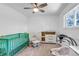 Bright Bedroom with a crib, changing table, and calming decor at 6211 S Garfield Dr, Centennial, CO 80121
