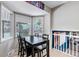 Bright dining area with backyard views and a decorative 