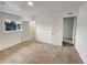 Well-lit bedroom with carpet and closet at 8019 Wolff St # H, Westminster, CO 80031