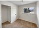 Bright bedroom with neutral walls, carpeting, and a sizable closet at 8019 Wolff St # H, Westminster, CO 80031