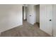 Spacious bedroom with neutral walls and carpeting, and two closets at 8019 Wolff St # H, Westminster, CO 80031