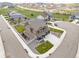 Aerial view of a suburban house with fenced yard and a view of the surrounding community at 2040 Rosette Pl, Castle Rock, CO 80104
