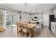 Dining area features a sliding glass door to the patio, plus kitchen access at 2040 Rosette Pl, Castle Rock, CO 80104