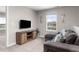 Loft area features a TV, comfortable couch and lots of natural light at 2040 Rosette Pl, Castle Rock, CO 80104