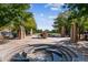 Beautiful community park with art installations, water features, walkways and ample trees at 2958 Syracuse St # 214, Denver, CO 80238